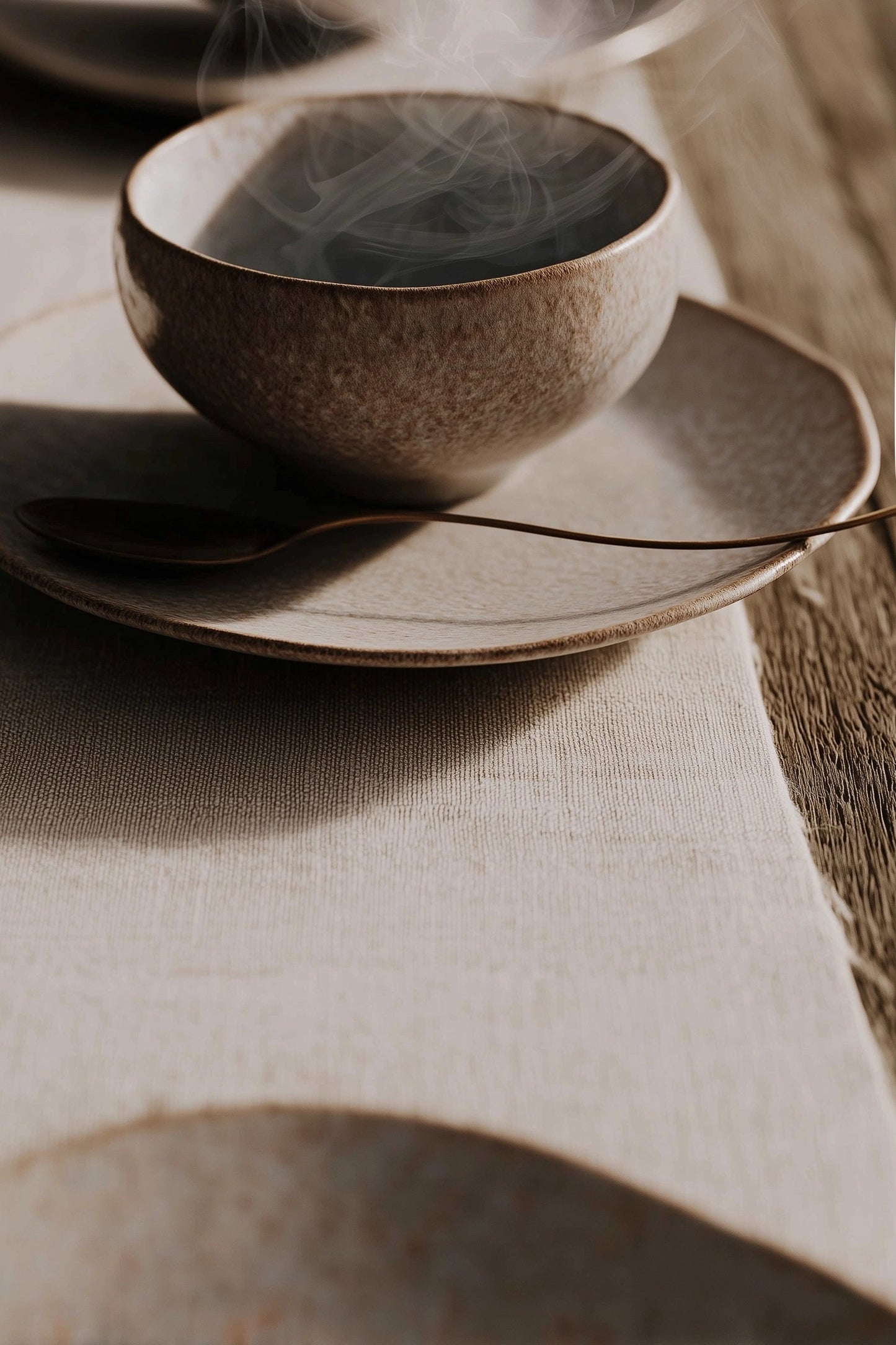 MOODFORM — a steaming cup in warm light